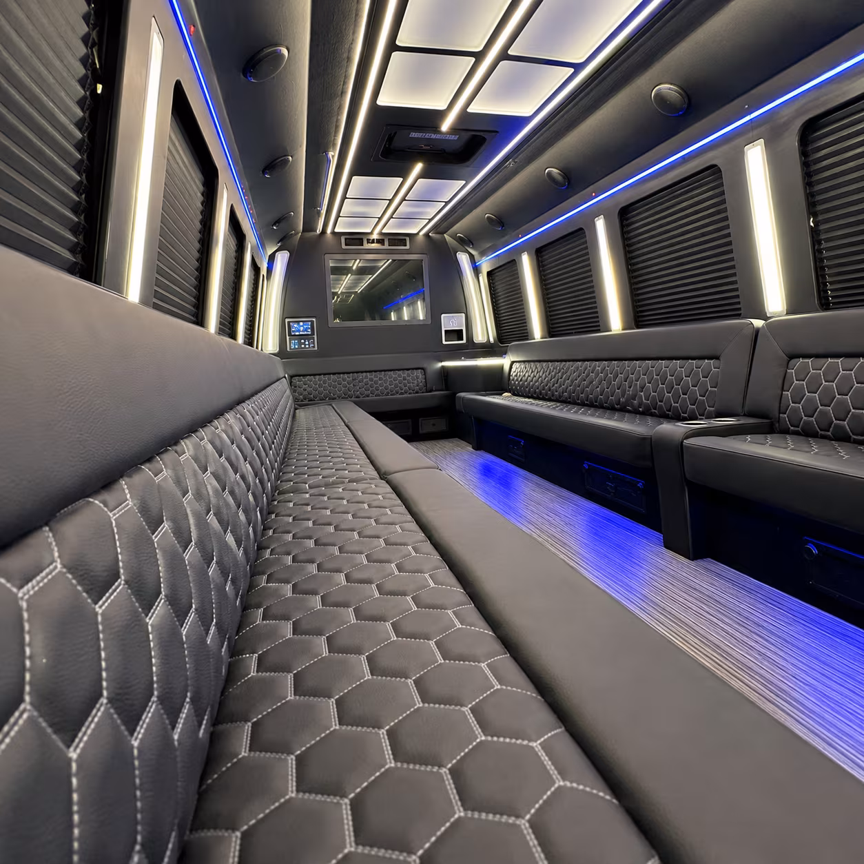 Wedding guests seated inside a party bus serving Raleigh